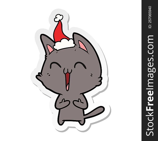 happy hand drawn sticker cartoon of a cat wearing santa hat. happy hand drawn sticker cartoon of a cat wearing santa hat