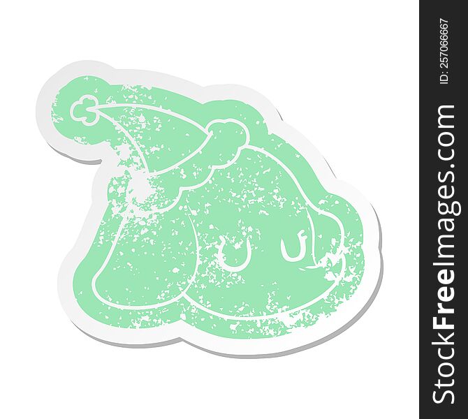 quirky cartoon distressed sticker of a elephant face wearing santa hat