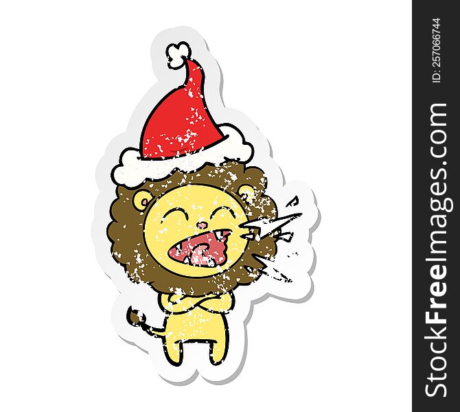 Distressed Sticker Cartoon Of A Roaring Lion Wearing Santa Hat