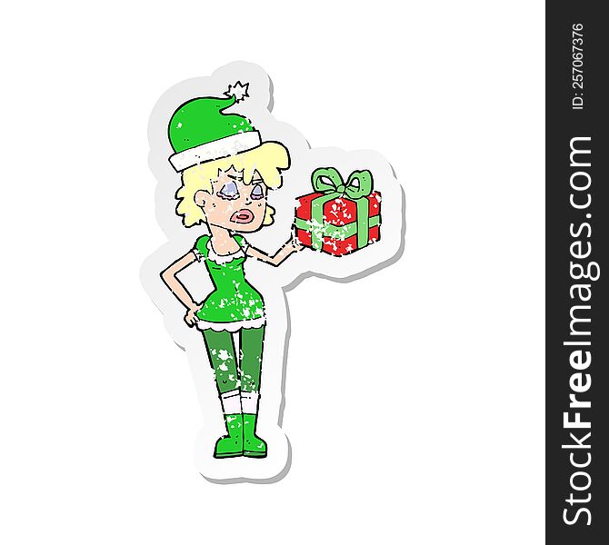 retro distressed sticker of a santas helper with christmas present