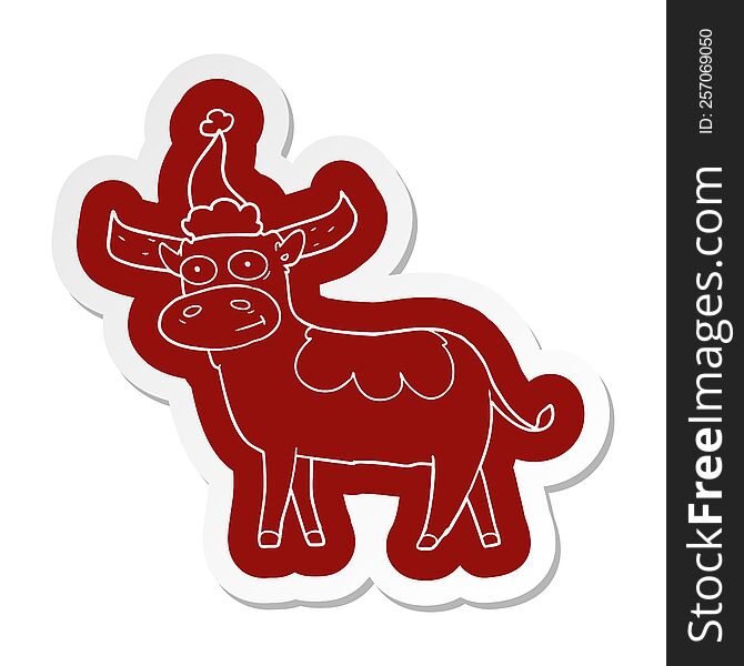Cartoon  Sticker Of A Bull Wearing Santa Hat