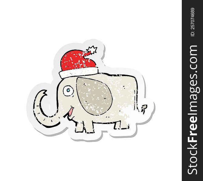 Retro Distressed Sticker Of A Cartoon Elephant In Christmas Hat