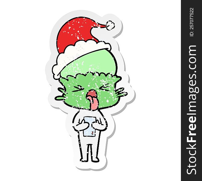 Disgusted Distressed Sticker Cartoon Of A Alien Wearing Santa Hat