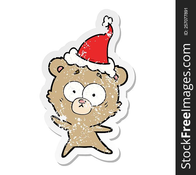 Anxious Bear Distressed Sticker Cartoon Of A Wearing Santa Hat