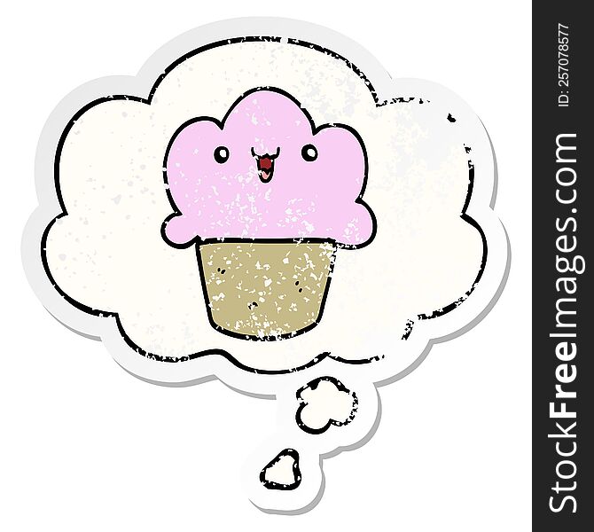 Cartoon Cupcake With Face And Thought Bubble As A Distressed Worn Sticker