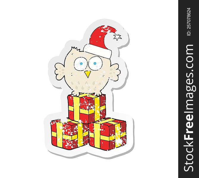 Retro Distressed Sticker Of A Cartoon Little Owl Wearing Christmas Hat