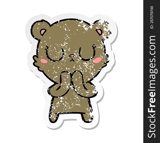 distressed sticker of a peaceful cartoon bear cub