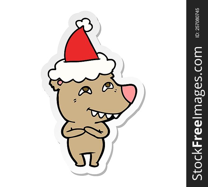 hand drawn sticker cartoon of a bear showing teeth wearing santa hat