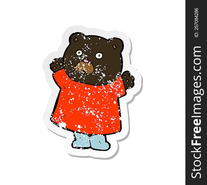retro distressed sticker of a funny cartoon black bear