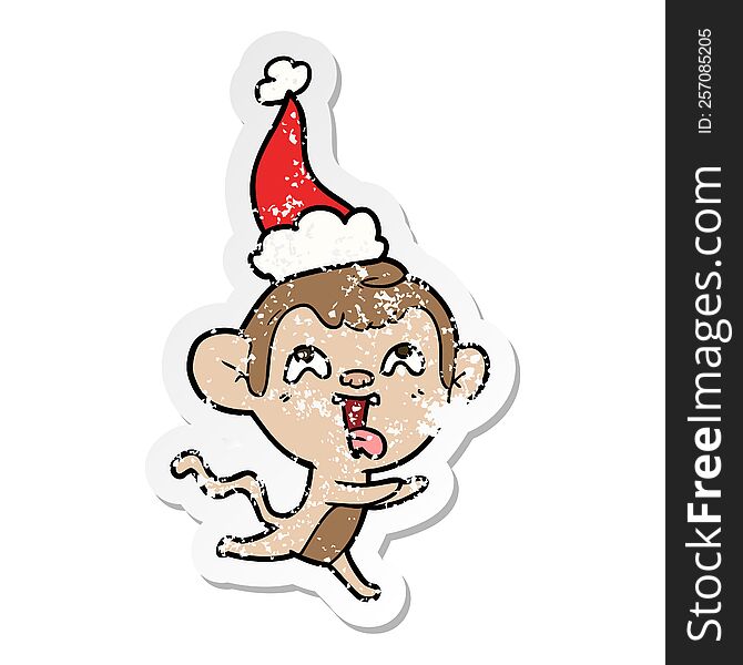 crazy hand drawn distressed sticker cartoon of a monkey running wearing santa hat