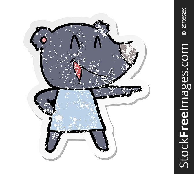 Distressed Sticker Of A Cartoon Bear In Dress Laughing And Pointing