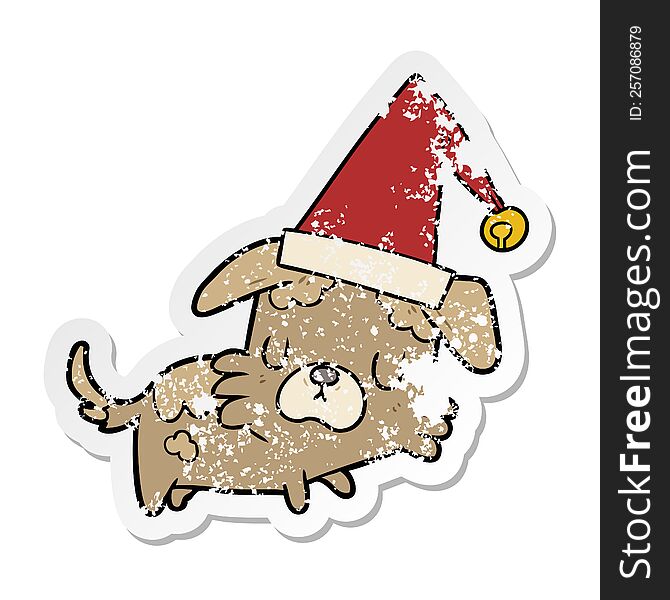 Distressed Sticker Of A Cartoon Dog In Christmas Hat