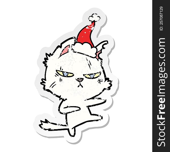 Tough Distressed Sticker Cartoon Of A Cat Wearing Santa Hat