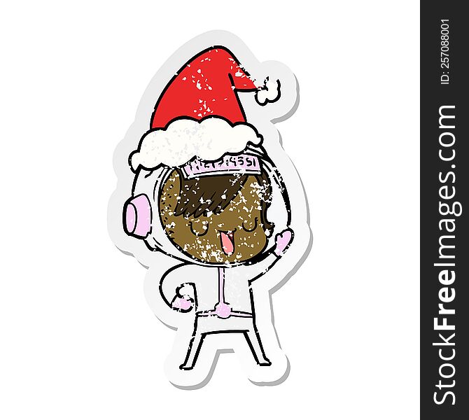 hand drawn distressed sticker cartoon of a astronaut woman wearing santa hat