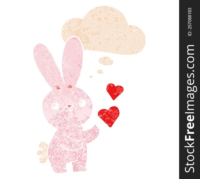 cute cartoon rabbit with love hearts and thought bubble in retro textured style