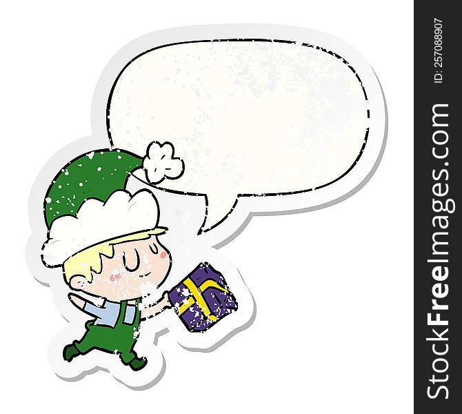 Cartoon Happy Christmas Elf And Present And Speech Bubble Distressed Sticker