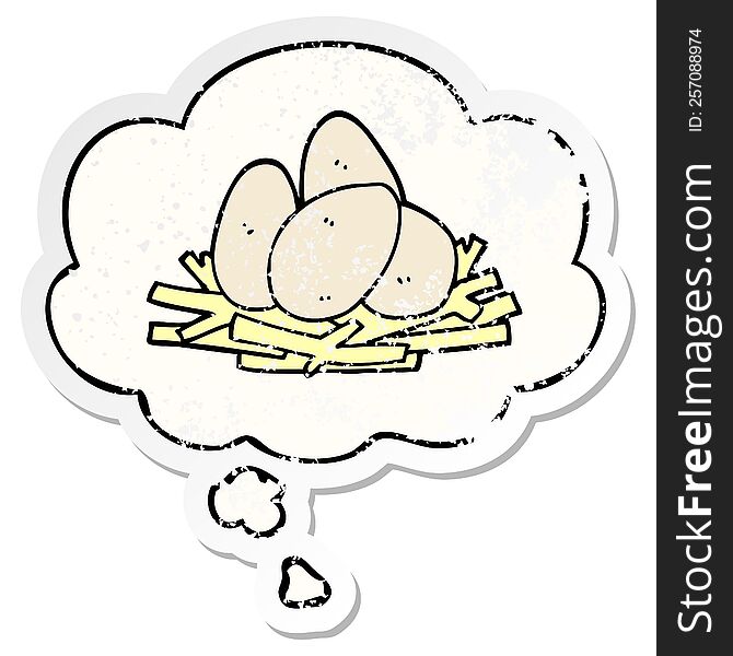 cartoon eggs in nest with thought bubble as a distressed worn sticker