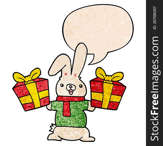 cartoon rabbit and christmas presents and speech bubble in retro texture style