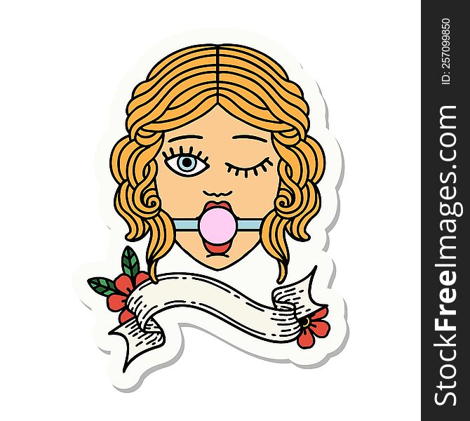 tattoo style sticker with banner of a winking female face wearing ball gag. tattoo style sticker with banner of a winking female face wearing ball gag
