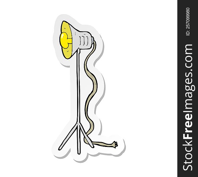 sticker of a cartoon studio lamp shining