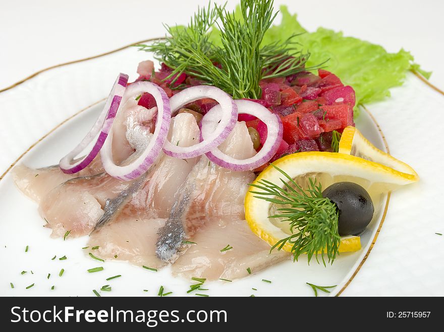 Salad with fish on white