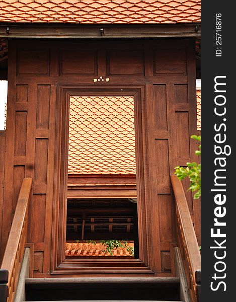 Ancient thai style wooden doorway. Ancient thai style wooden doorway