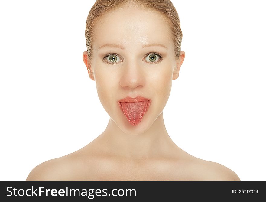Cheerful girl shows tongue isolated on white background