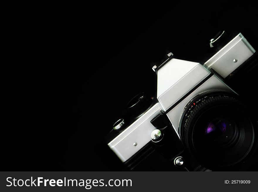 Classic camera frame over black background. Classic camera frame over black background