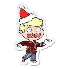 Distressed Sticker Cartoon Of A Stressed Out Pointing Wearing Santa Hat Stock Photo Distressed Sticker Cartoon Of A Stressed Out Pointing Wearing Santa Hat Stock Photo