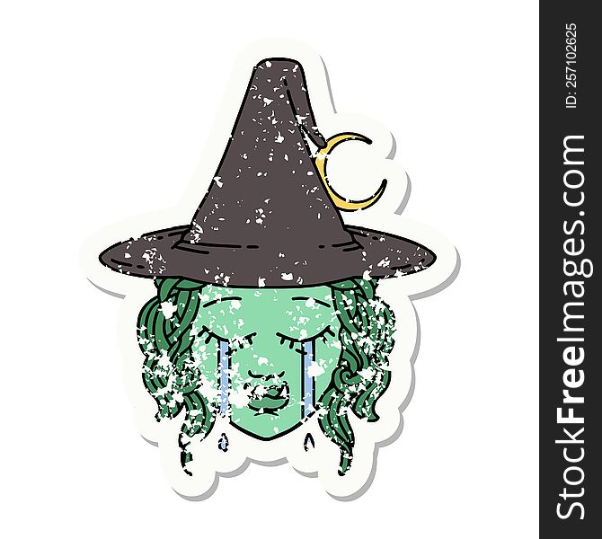 grunge sticker of a crying half orc witch character face. grunge sticker of a crying half orc witch character face