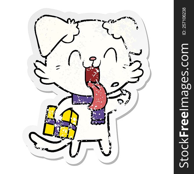 distressed sticker of a cartoon panting dog with present