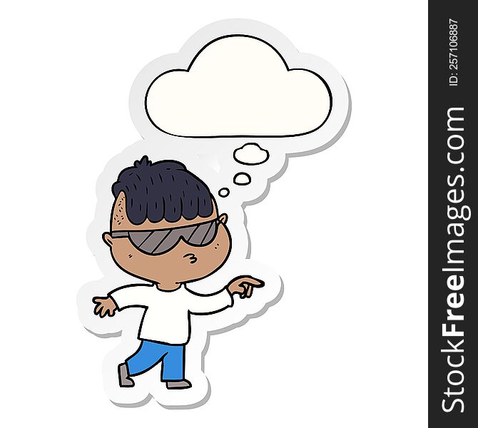 cartoon boy wearing sunglasses pointing with thought bubble as a printed sticker