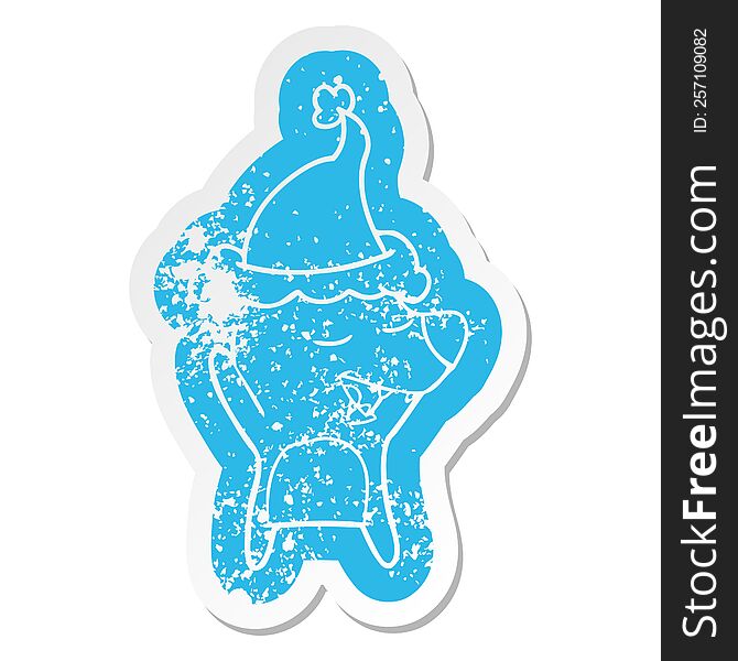 Cartoon Distressed Sticker Of A Bear Wearing Santa Hat