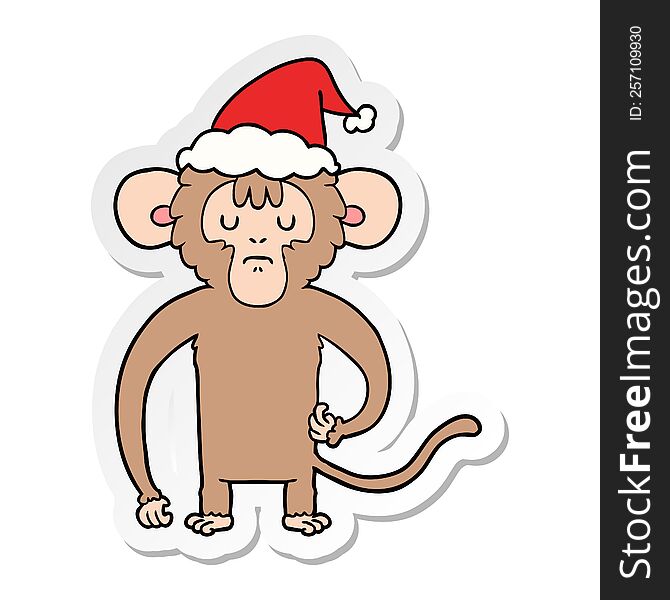 sticker cartoon of a monkey scratching wearing santa hat