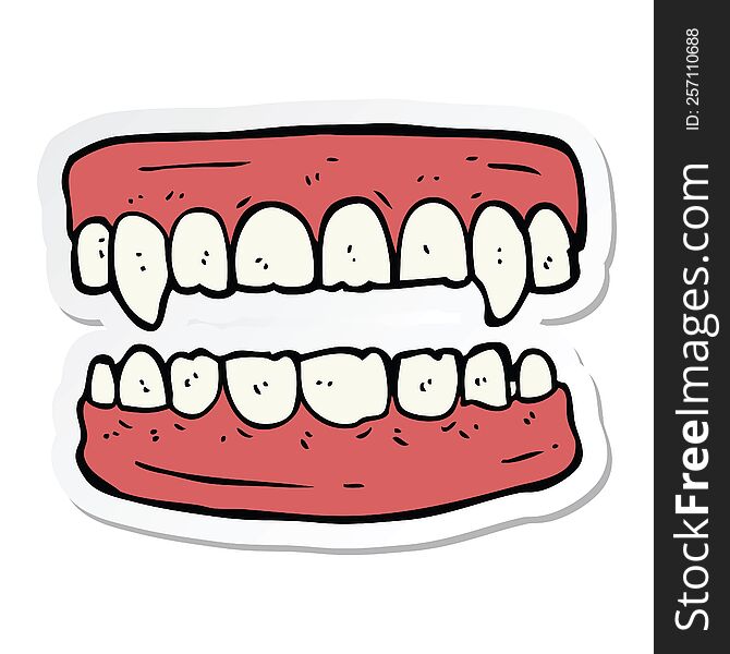 sticker of a cartoon vampire teeth
