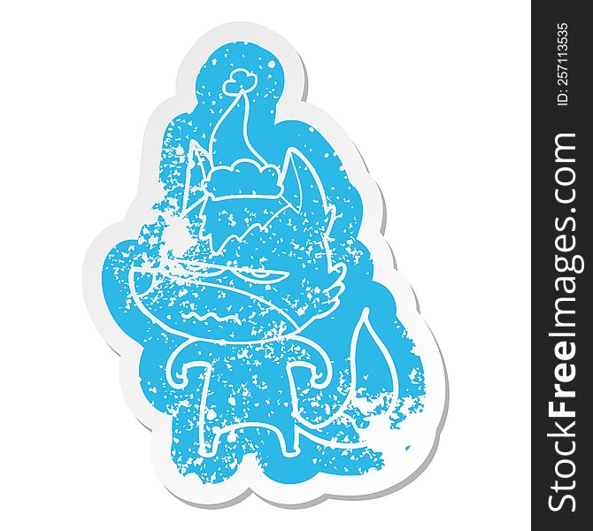 Cartoon Distressed Sticker Of A Annoyed Wolf Wearing Santa Hat