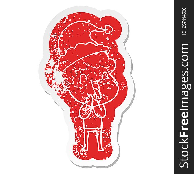 quirky cartoon distressed sticker of a happy man wearing santa hat