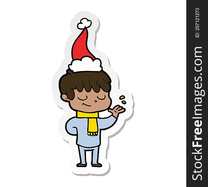hand drawn sticker cartoon of a happy boy wearing santa hat