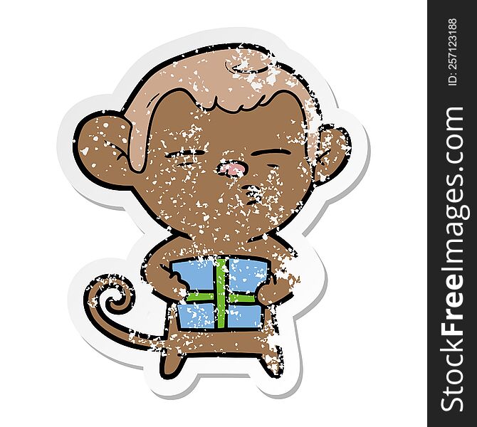 Distressed Sticker Of A Cartoon Suspicious Monkey With Present