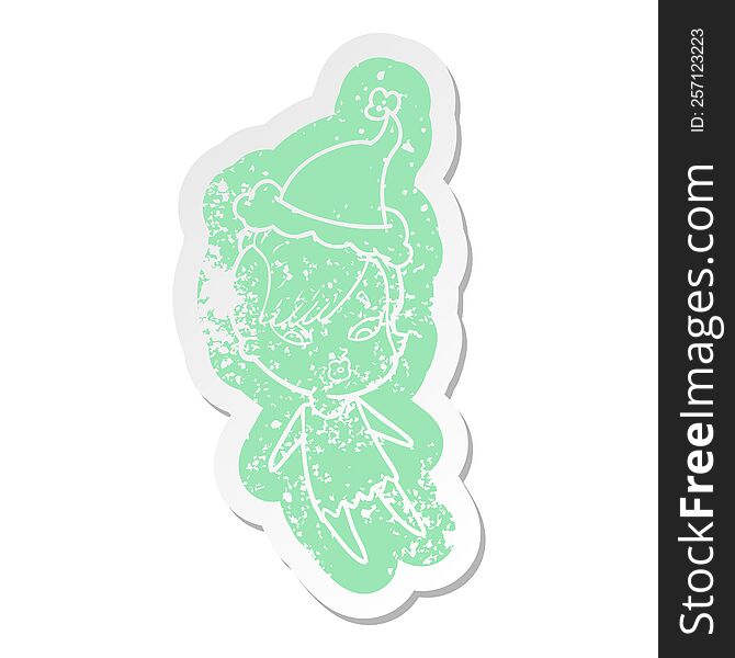 quirky cartoon distressed sticker of a surprised girl wearing santa hat