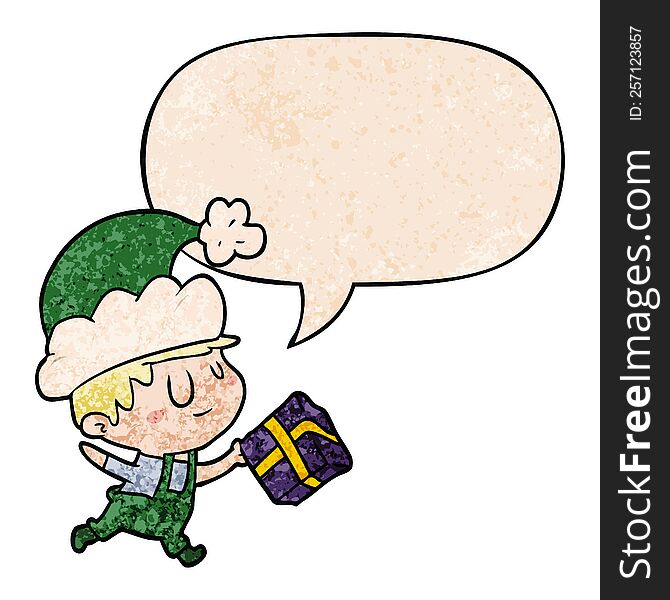 cartoon happy christmas elf and present and speech bubble in retro texture style