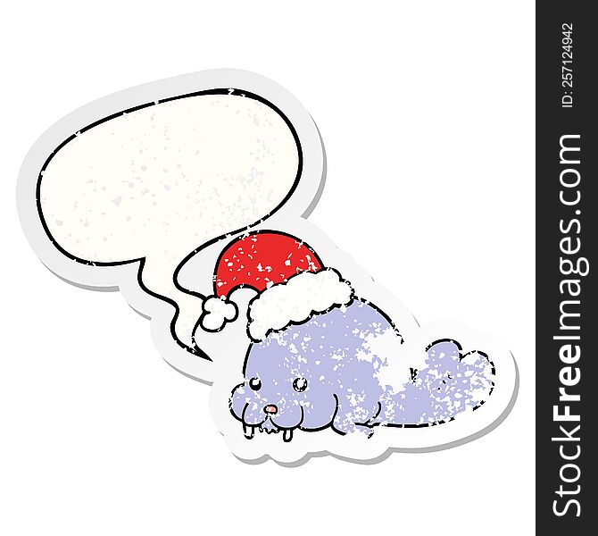 cartoon christmas walrus with speech bubble distressed distressed old sticker. cartoon christmas walrus with speech bubble distressed distressed old sticker