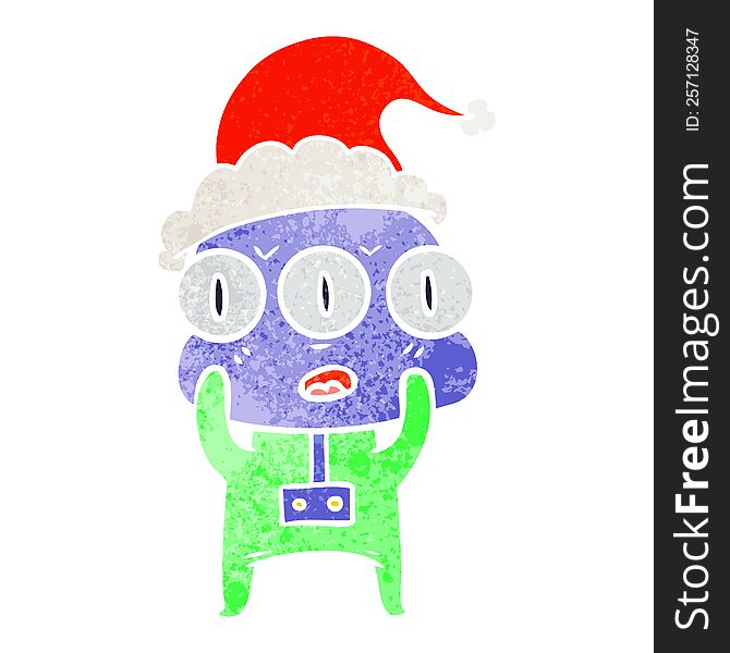 Retro Cartoon Of A Three Eyed Alien Wearing Santa Hat