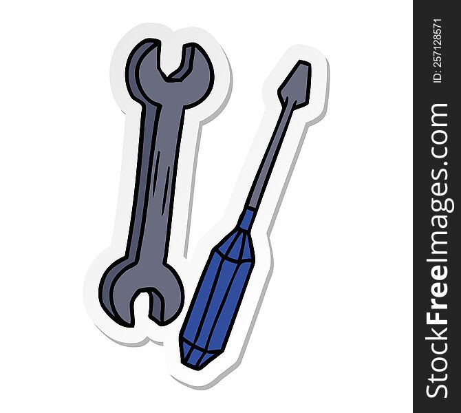 hand drawn sticker cartoon doodle of a spanner and a screwdriver