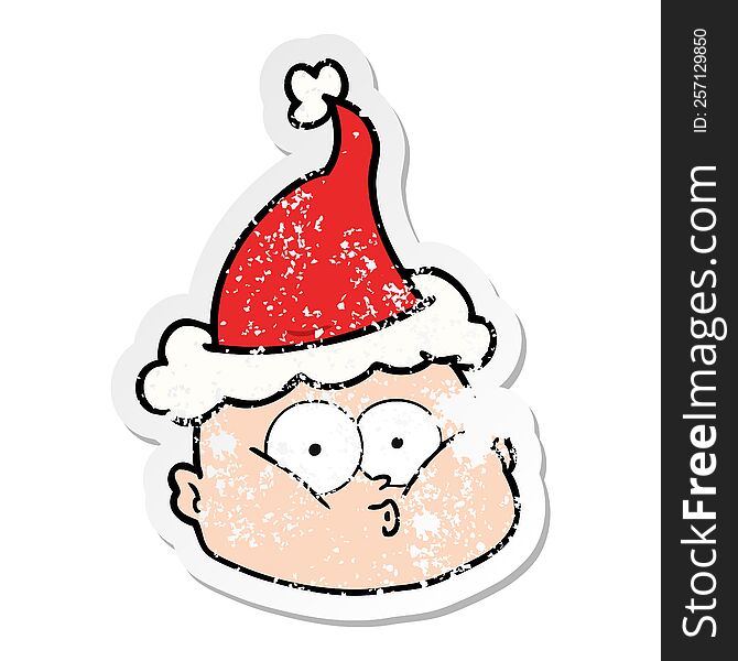 hand drawn distressed sticker cartoon of a curious bald man wearing santa hat