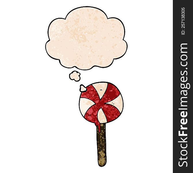 cartoon lollipop with thought bubble in grunge texture style. cartoon lollipop with thought bubble in grunge texture style