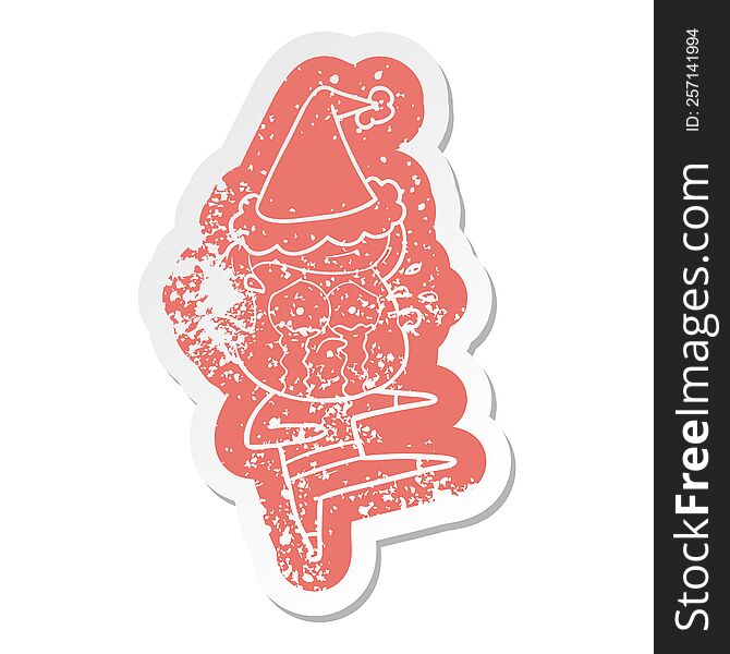 quirky cartoon distressed sticker of a crying dancer wearing santa hat