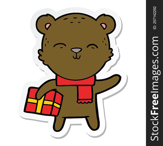 Sticker Of A Happy Cartoon Bear With Present