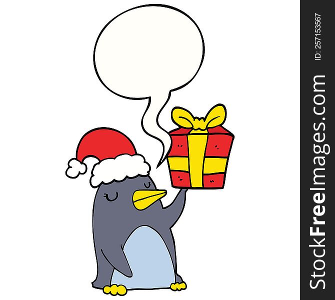 Cartoon Penguin And Christmas Present And Speech Bubble