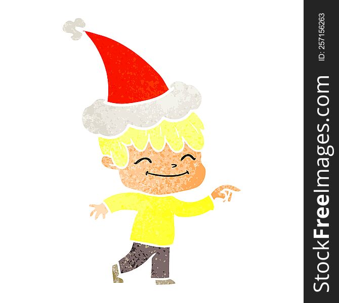 hand drawn retro cartoon of a happy boy wearing santa hat